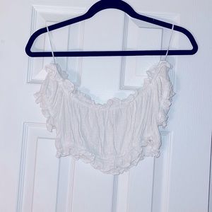 Cropped, off-the-shoulder shirt. Size small.